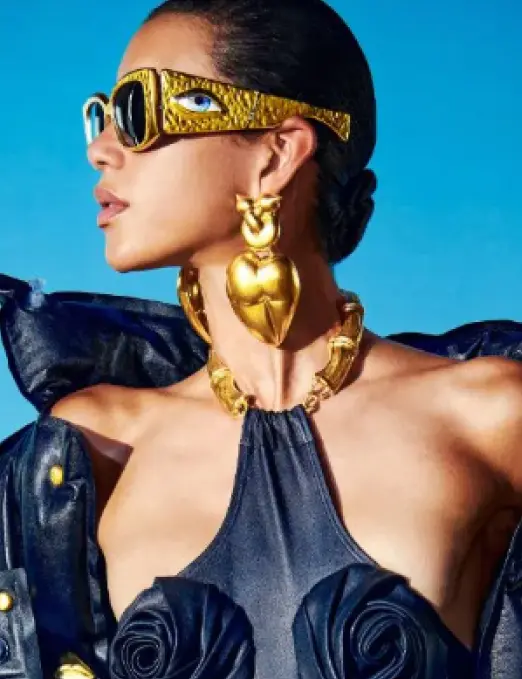 Fashion model with gold accessories